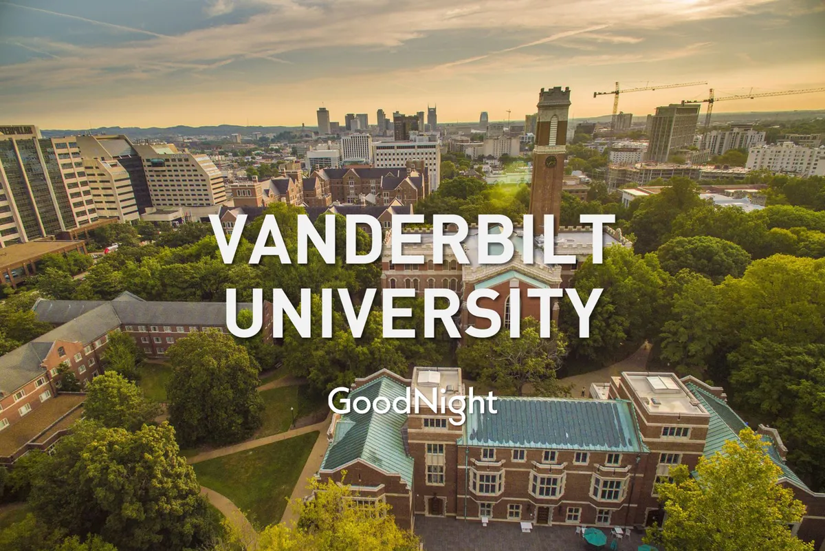 A panoramic view over Vanderbilt University’s campus, highlighting the clock tower, green spaces, and the city skyline beyond. The environment is inspiring and reinforces the connection to prestigious local institutions.